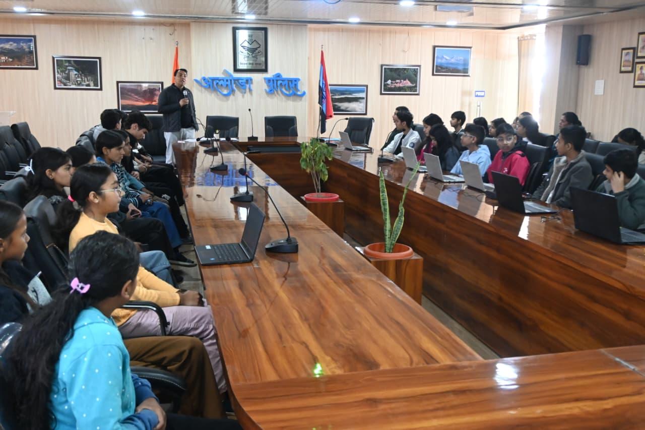 Large group of students attending a career seminar at the Almora Police conference hall.