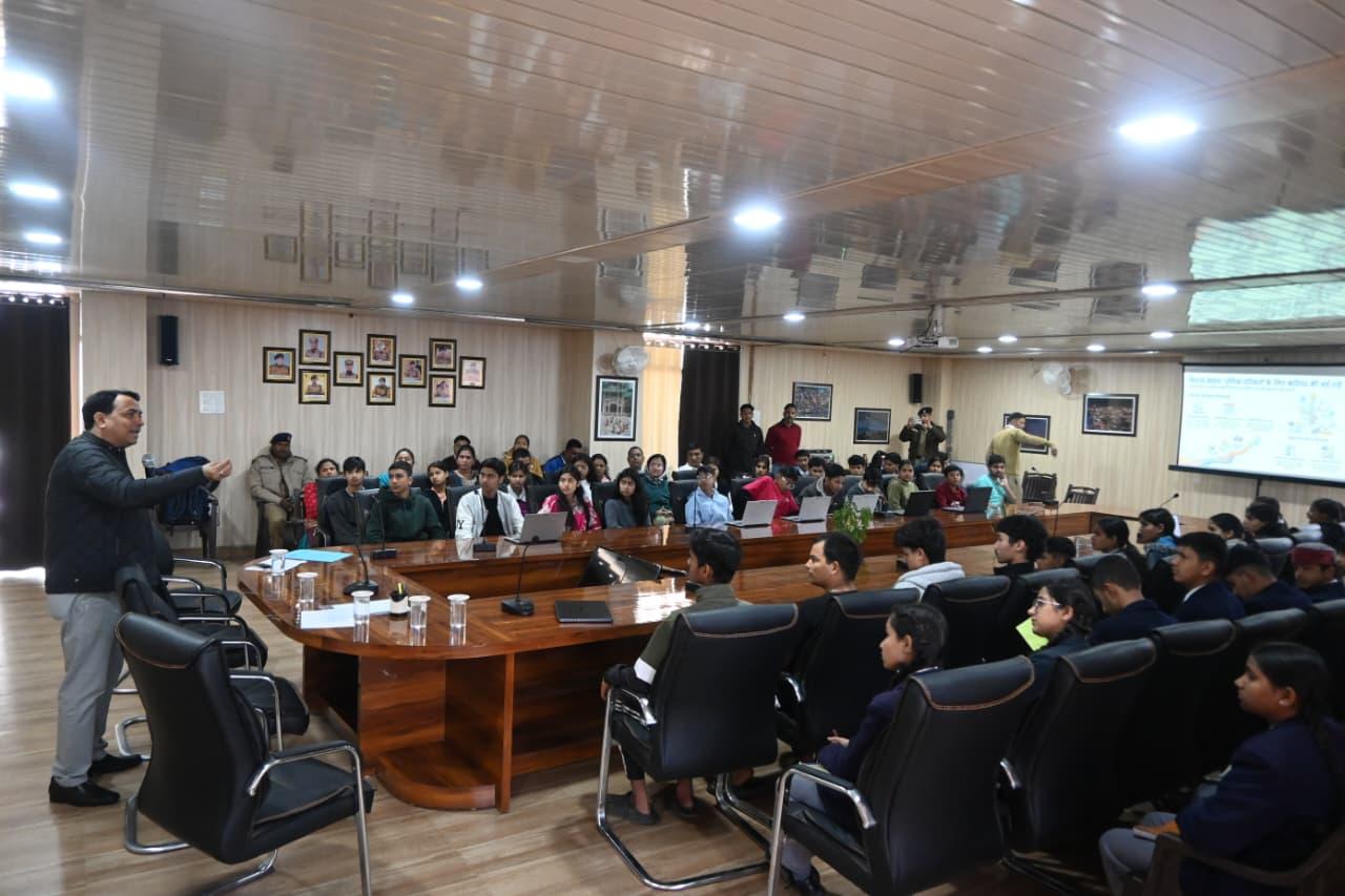 Interactive session addressing student queries at the Almora Police facility.