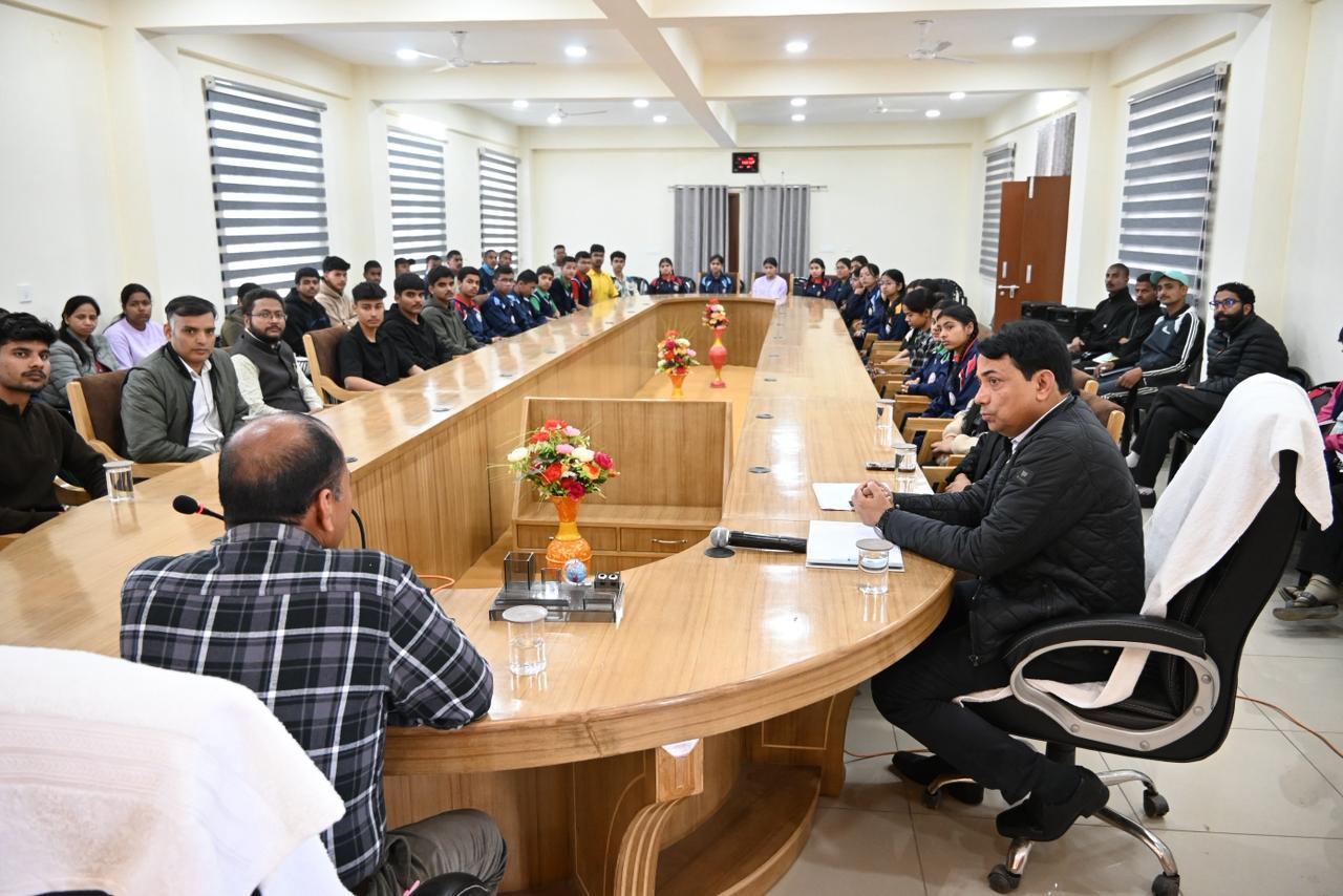 Interactive student career seminar in a modern Pithoragarh conference room.